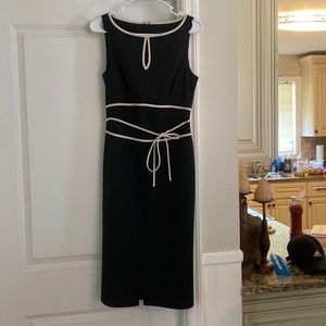 Limited women’s dress. Hits below the knee.